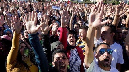 Thousands of Moroccans shout slogans during a demonstration in the northern town of Al-Hoceima  seven months after a fishmonger was crushed to death inside a garbage truck as he tried to retrieve fish confiscated by the police  in Al-Hoceima  Morocco May 18  2017  REUTERS Youssef Boudlal